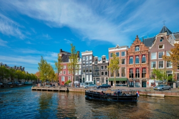 9 Day Amsterdam, Bruges, Paris & London Tour w/ Air